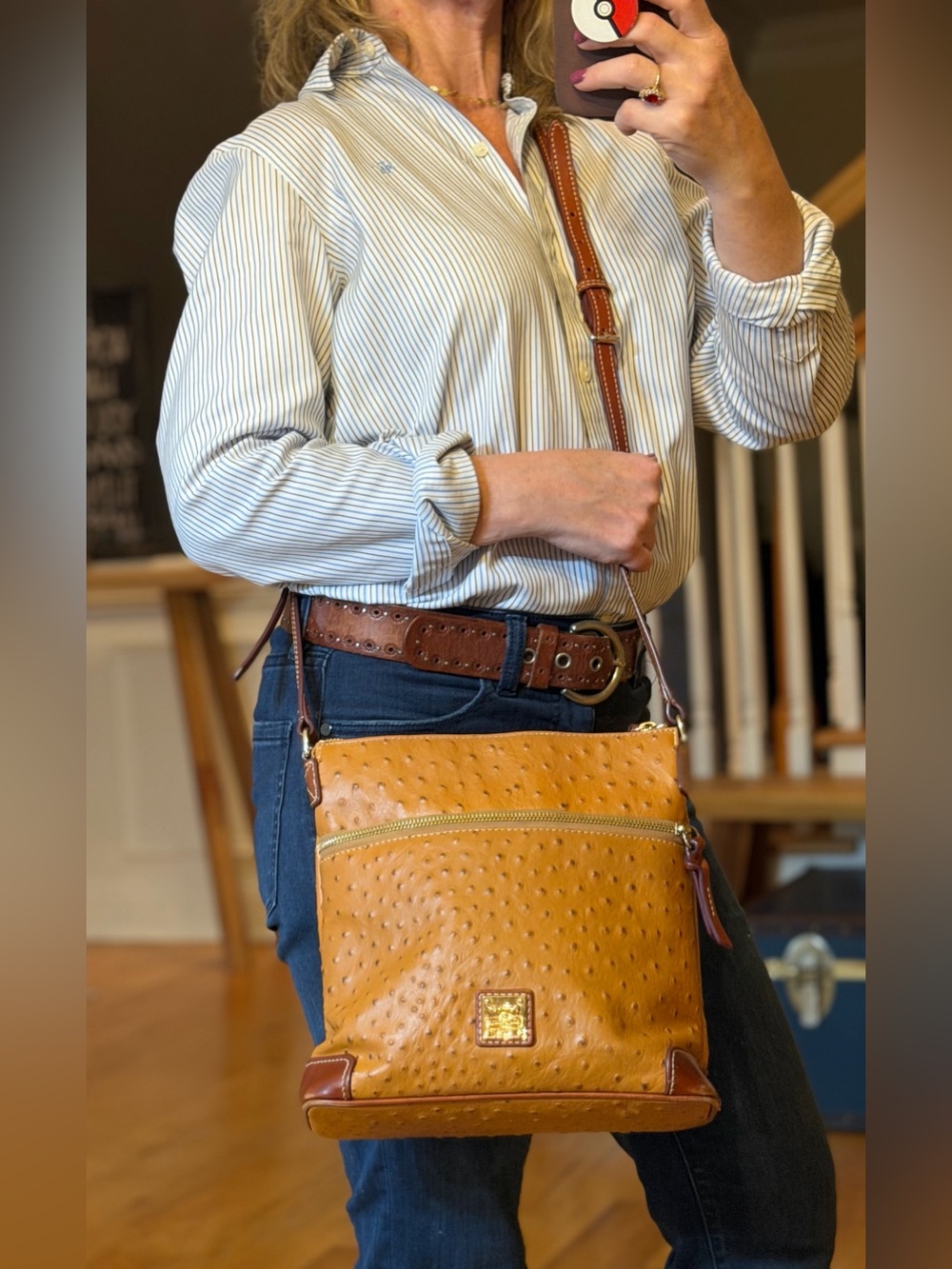 Dooney & Bourke Classic Ostrich-Embossed Letter Carrier Crossbody Cognac